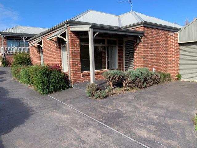 SPACIOUS UNIT WITH AIR CONDITIONING IN PERFECT LOCATION