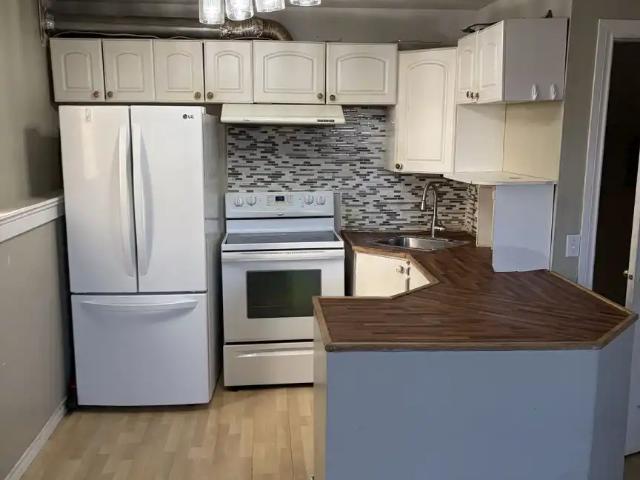 Spacious walkup basement located within a short walk of all essential amenities