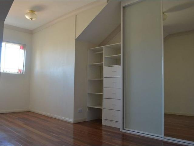 Spacious, well maintained townhouse with polished floors