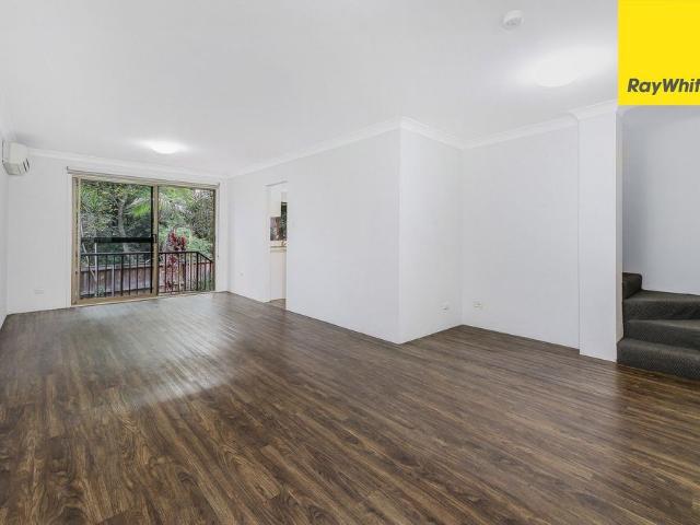 Spacious & Well Maintained Two Bedroom Townhouse in Convenient Location