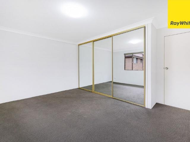 Spacious & Well Maintained Two Bedroom Townhouse in Convenient Location