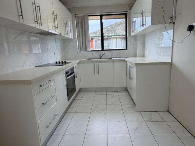 Spacious & Well Presented Two Bedroom Apartment with Lock Up Garage