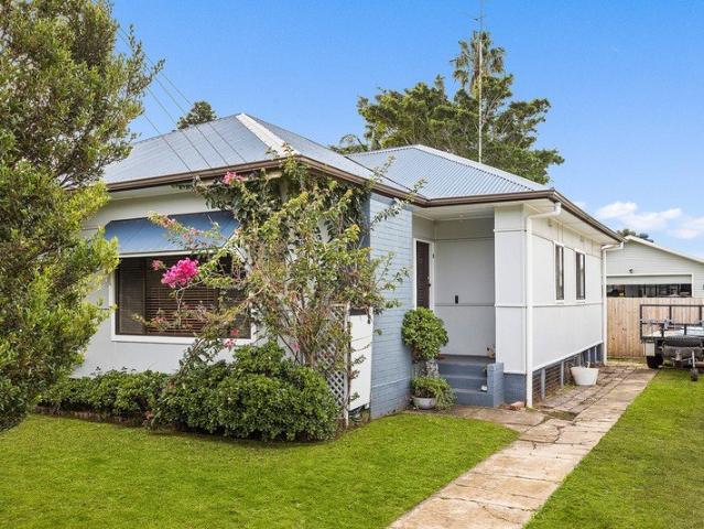 Spacious Woonona Home with Oversized Shed and Development Appeal