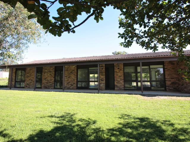 Spacious Acreage Family Home