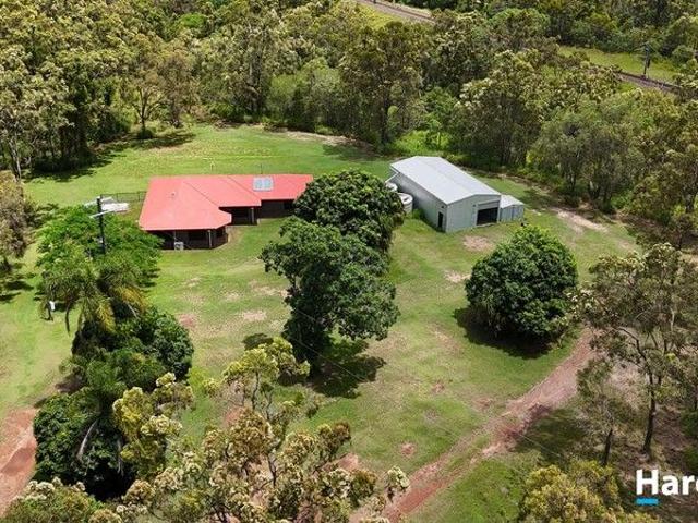 SPACIOUS ACREAGE LIVING WITH LARGE SHED CLOSE TO TOWN!