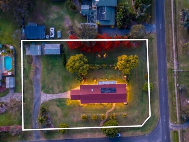 Spacious Acreage Living with Sheds, Solar & Room to Move