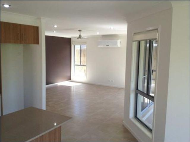SPACIOUS AIR CONDITIONED HOME WITH LARGE BACKYARD