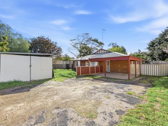 Spacious and Freshly Repainted Four Bedroom Home!