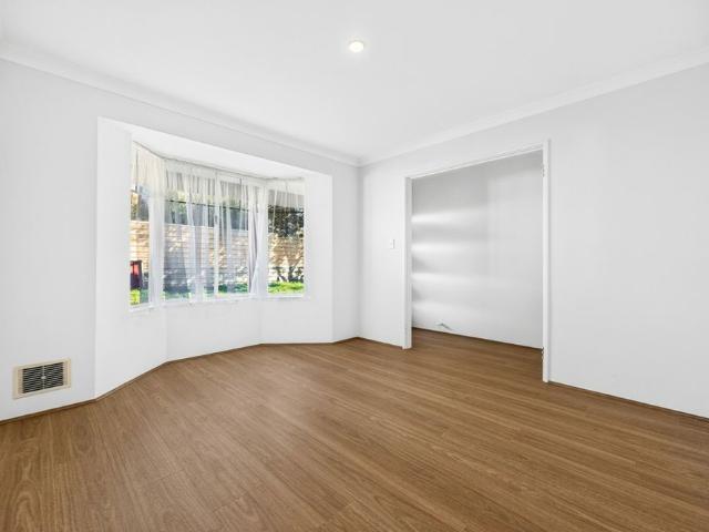 Spacious and Freshly Repainted Four Bedroom Home!