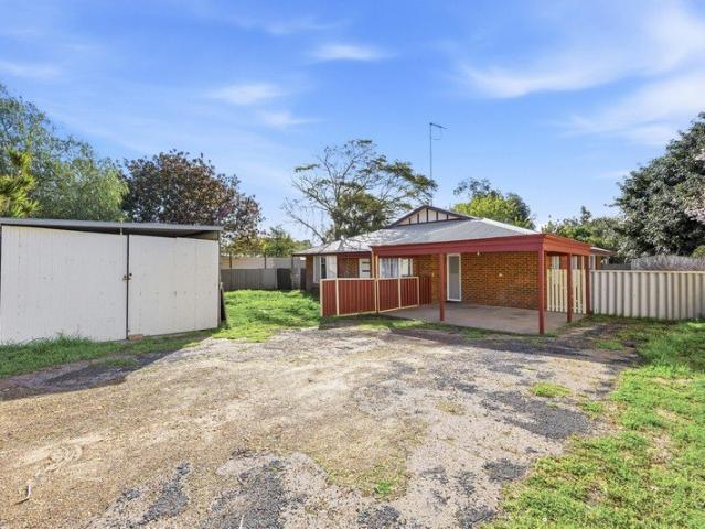 Spacious and Freshly Repainted Four Bedroom Home!