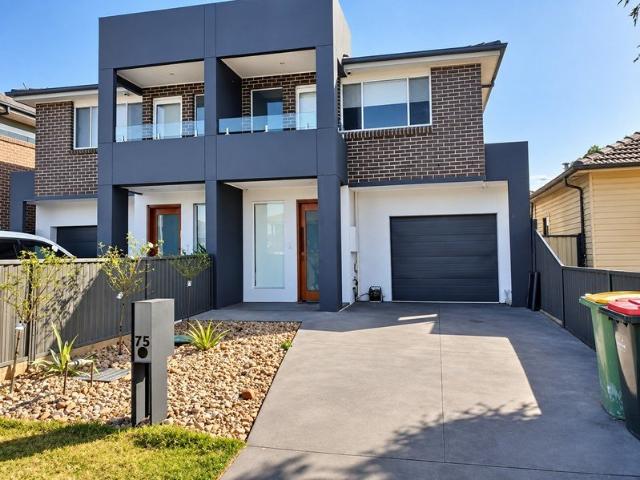 Spacious and Modern 5 Bedroom Home!