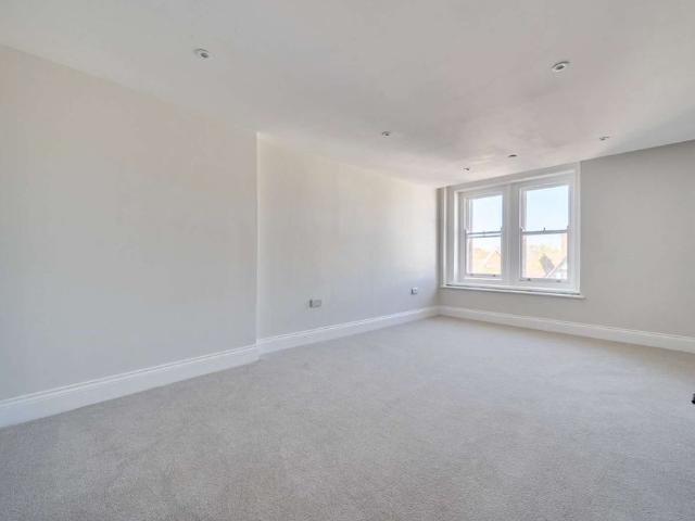 Spacious and well presented two bedroom third floor apartment offering bright open plan living in the heart of Salisbury city centre