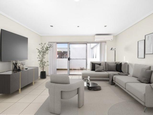 Spacious and Versatile Split Level Apartment with Attic Retreat and Dual Balconies