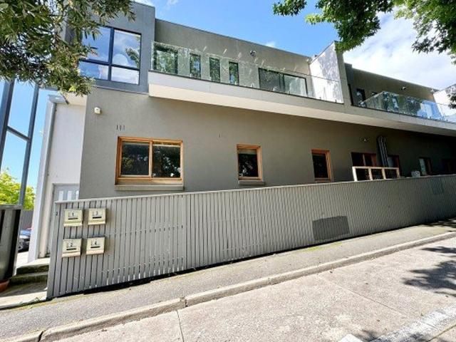 Spacious Apartment in Central Location adjoining a great group of shops ENTER FROM LANE OFF OF KAREELA RD