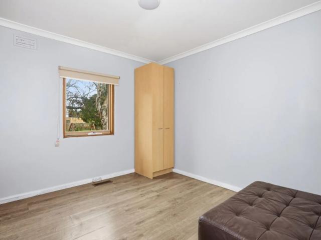 Spacious Apartment in Central Location adjoining a great group of shops ENTER FROM LANE OFF OF KAREELA RD