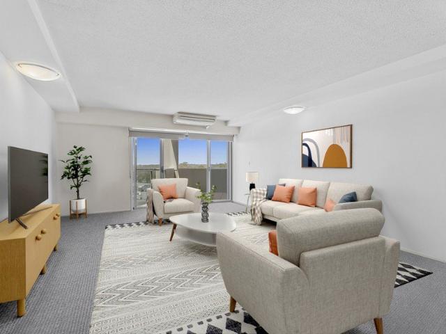 SPACIOUS APARTMENT w/ TWO CAR SPOTS & STORAGE