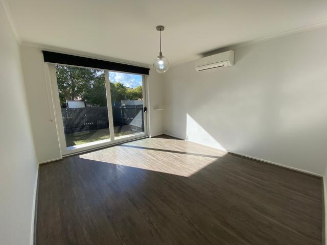 Spacious Apartment with a private courtyard & store room!