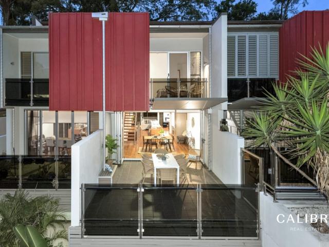 spacious, architecturally designed town home in premium location