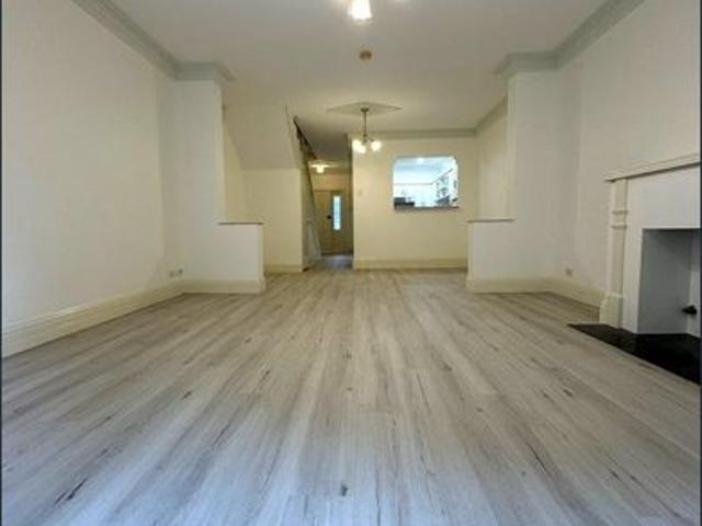 Spacious, art deco style three level, three bedroom unit