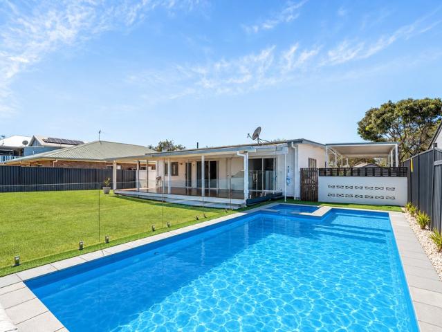 Spacious Bayside Living with a Resort Style Backyard