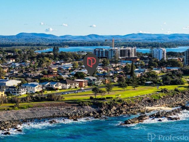 Spacious Beachside Living with Serene Park Views in an Exclusive Boutique Building