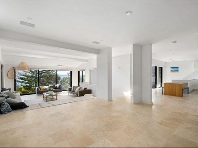 SPACIOUS BEACHSIDE LIVING WITH STUNNING OCEAN VIEWS