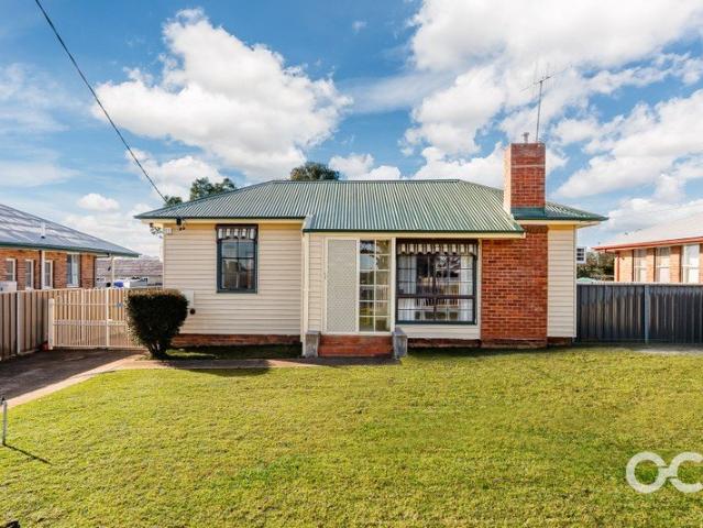 Spacious Block, Quaint Home, Endless Opportunity