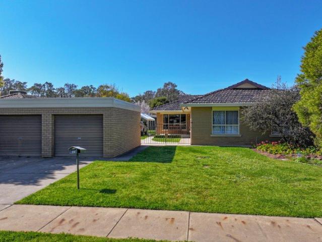 SPACIOUS BRICK VENEER HOME WITH EXCEPTIONAL SHEDDING & ROOM TO MOVE