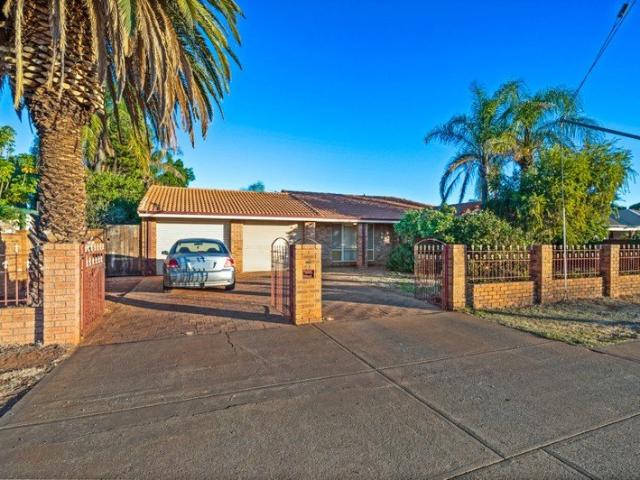 Spacious, Brick FIVE Bedroom Home  With The Bonus Of A Sparkling Below Ground Pool!