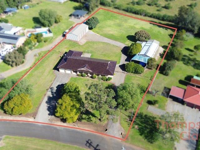 Spacious Brick Home on 5,705m² with Sheds, Space & Lifestyle Appeal