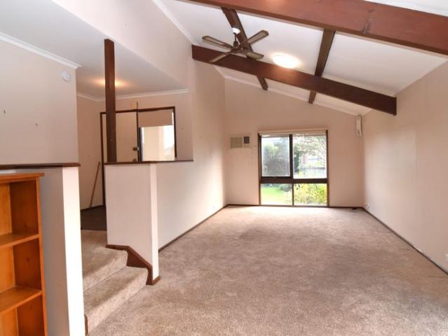 Spacious Brick Home with Large Yard and Secure Side Access