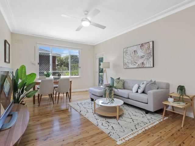 Spacious, Bright & Convenient 2 Bedroom Unit With Lock Up Garage