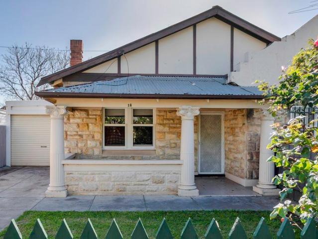 SPACIOUS CHARACTER DUPLEX IN PRIME LOCATION