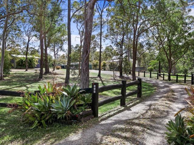 Spacious Character Home on 2.5 Acres with Huge Sheds & Dam