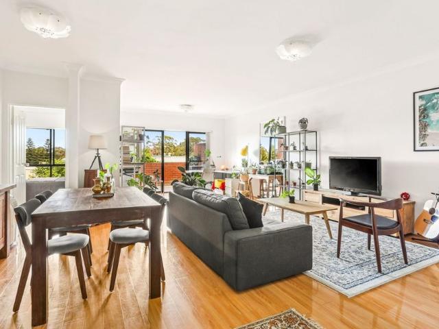 Spacious Contemporary Apartment in Quiet Setting at Rear of Complex!