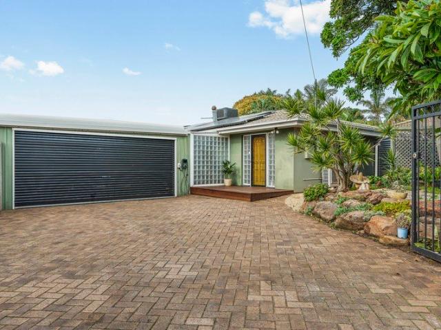 PRICED TO SELL Spacious Coastal Entertainer with Poolside Appeal