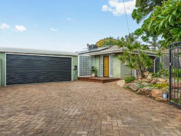 PRICED TO SELL Spacious Coastal Entertainer with Poolside Appeal