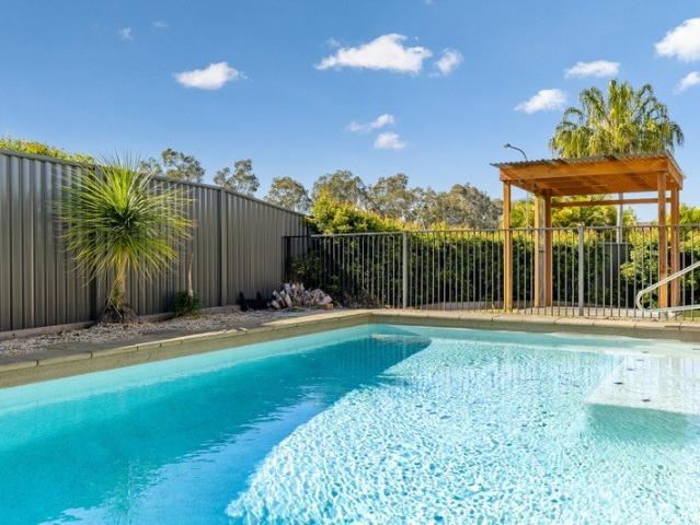 Spacious Coastal Living with a Stunning Pool Side Access Air Conditioning To All Bedrooms