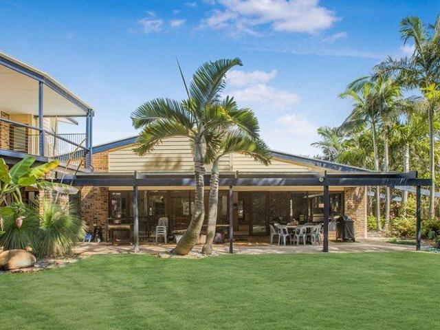 Spacious Coastal Retreat with Tropical Gardens and Timeless Character