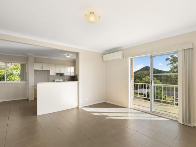 Spacious Coastal Unit with Water Glimpses