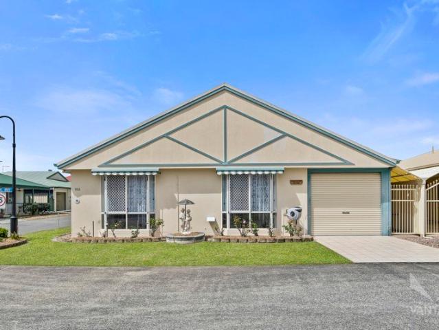 Spacious Corner Home with Cathedral Ceilings