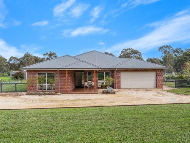 Spacious country living with premium appeal on 1 acre
