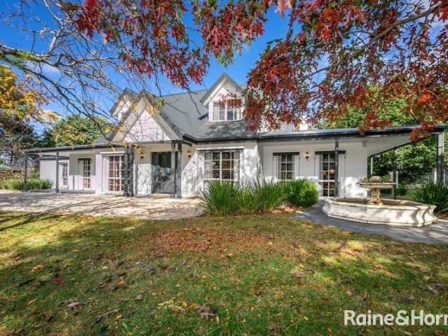 Spacious country living on a private acre!