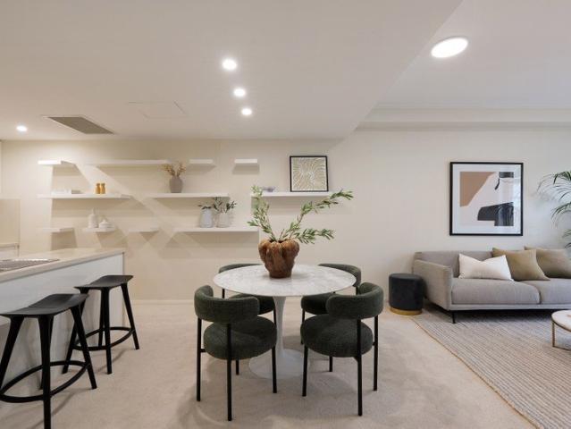 Spacious courtyard apartment offering house like proportions