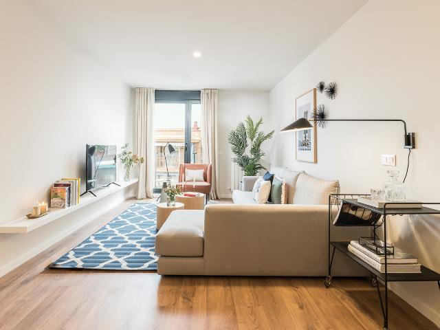 Spacious designer apartment in a building with swimming pool