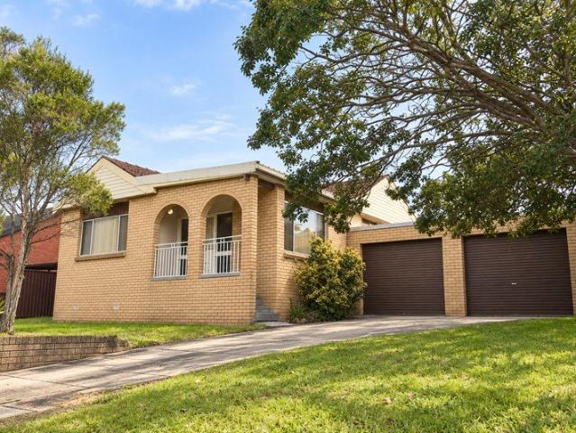 SPACIOUS DOUBLE BRICK HOME WITH OVERSIZED GARAGE