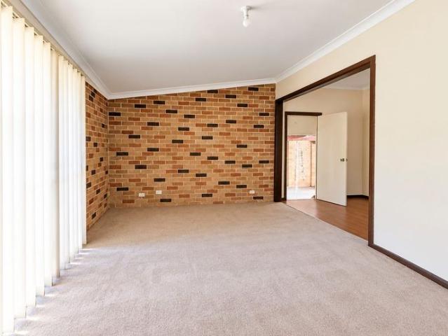SPACIOUS DOUBLE BRICK HOME WITH OVERSIZED GARAGE