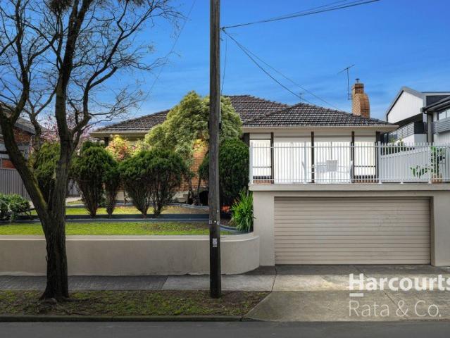 Spacious Dual Level Residence with Exceptional Potential