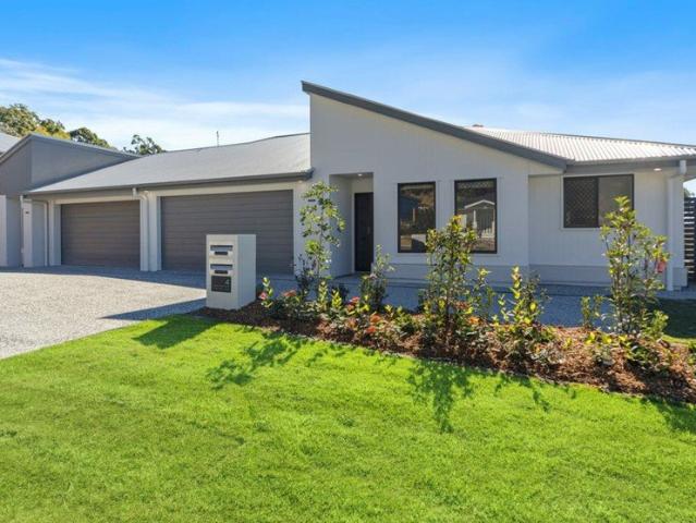 Spacious Duplex Living in Growing Logan Reserve