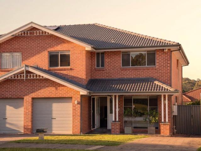 Spacious Duplex with Versatile Living Spaces in Prime Location